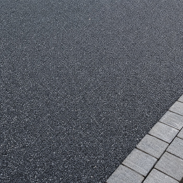 Close-up of charcoal resin-bound driveway aggregate