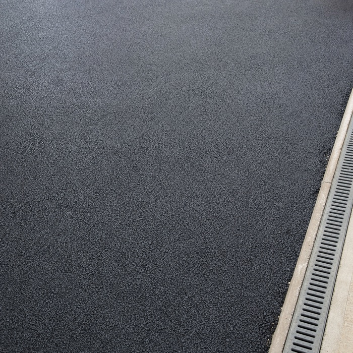 Close-up of newly laid dark tarmac
